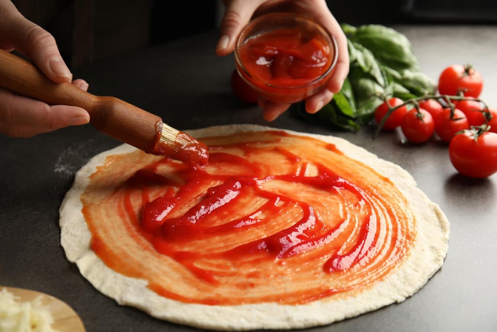 hacer salsa tomate pizza